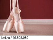 Ballet shoes on floor indoors. Стоковое фото, фотограф Pixel_shot / Фотобанк Лори
