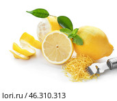 Ripe lemons with zest on white background. Стоковое фото, фотограф Pixel_shot / Фотобанк Лори