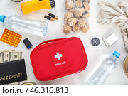 Necessities for emergency bag on white background. Стоковое фото, фотограф Pixel_shot / Фотобанк Лори