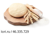 Fresh wheat dough and flour on white background. Стоковое фото, фотограф Pixel_shot / Фотобанк Лори