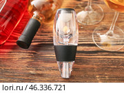 Wine aerator on wooden background. Стоковое фото, фотограф Pixel_shot / Фотобанк Лори