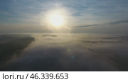 Flight over the river in the fog at dawn. Стоковое видео, видеограф Михаил Коханчиков / Фотобанк Лори