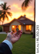 Realtor's hand with keys to house for beach holiday in hot tropics with palm trees. Hotel reservations, booking, moving to new house, mortgage, rent and purchase of real estate. AI generated. Стоковое AI-изображение, AI-художник Ольга Симонова / Фотобанк Лори
