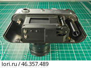 Karachev, Bryansk region Russia - February, 25, 2025: Retro photographic equipment of the USSR – FED-5 rangefinder film camera with an Industar-61L/D lens. Close-up. Virtual Museum of Electronics. Редакционное фото, фотограф Андрей Жигальцов / Фотобанк Лори