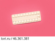 Blister of hormonal pills on pink background. Стоковое фото, фотограф Pixel_shot / Фотобанк Лори