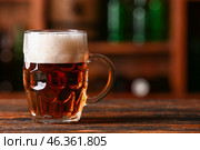 Mug of beer on table in bar. Oktoberfest celebration. Стоковое фото, фотограф Pixel_shot / Фотобанк Лори