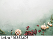 Spicy beef jerky on grunge background. Стоковое фото, фотограф Pixel_shot / Фотобанк Лори