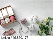 Items for scrapbooking on white wooden background. Стоковое фото, фотограф Pixel_shot / Фотобанк Лори