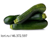 Fresh zucchinis on white background. Стоковое фото, фотограф Pixel_shot / Фотобанк Лори