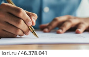 Detailed closeup of businessman hands writing with pen on a sheet of document. Business person Signing Contract In The Office on a Desk Table. Man in suit penning an agreement on paper. Productivity. Стоковое AI-видео, аниматор Марина Демидюк / Фотобанк Лори