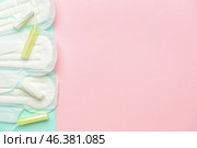 Menstrual pads and tampons on color background. Стоковое фото, фотограф Pixel_shot / Фотобанк Лори