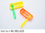 Jewish rattles for Purim holiday on white background. Стоковое фото, фотограф Pixel_shot / Фотобанк Лори