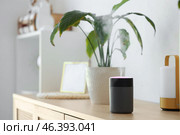 Air humidifier on commode in living room, closeup. Стоковое фото, фотограф Pixel_shot / Фотобанк Лори