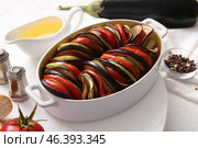 Baking dish of tasty Ratatouille on white background. Стоковое фото, фотограф Pixel_shot / Фотобанк Лори