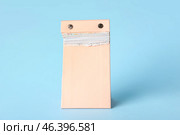 Tear-off calendar at the end of the year on color background. Стоковое фото, фотограф Pixel_shot / Фотобанк Лори
