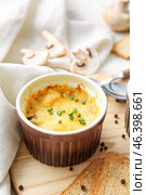 Ramekin with tasty julienne on table. Стоковое фото, фотограф Pixel_shot / Фотобанк Лори