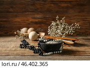 Composition with Tibetan prayer beads on wooden background. Стоковое фото, фотограф Pixel_shot / Фотобанк Лори