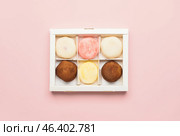 Box with tasty Japanese mochi on color background. Стоковое фото, фотограф Pixel_shot / Фотобанк Лори