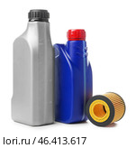 Canisters with car oil and filter on white background. Стоковое фото, фотограф Pixel_shot / Фотобанк Лори