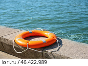 Lifebuoy ring on berth outdoors. Стоковое фото, фотограф Pixel_shot / Фотобанк Лори