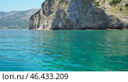 RT Dubovica Rocks near Buljarica and Svetac Rock, Montenegro. Stones, inaccessible rocks. Flysch marine lithological layers. Adriatic Mediterranean sea blue water. Nature park Katici. District Budva. Стоковое видео, видеограф Юлия Петровская / Фотобанк Лори
