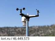 A weather measurement device positioned outdoors captures data. Стоковое фото, фотограф EugeneSergeev / Фотобанк Лори