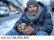Homeless man sitting on the sidewalk with an empty cup. Стоковое AI-изображение, AI-художник Евгений Харитонов / Фотобанк Лори