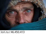 Portrait, look of an elderly homeless man wrapped in warm clothes. Стоковое AI-изображение, AI-художник Евгений Харитонов / Фотобанк Лори
