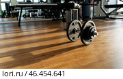 Barbell in the gym at dawn with a pred workout. Стоковое фото, фотограф Igor Skripachev / Фотобанк Лори