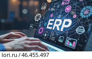 Person is typing on a laptop with ERP written on the screen. Стоковое AI-видео, аниматор Sergey Grishin / Фотобанк Лори