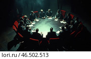 A dark, dramatic scene of a meeting of influential people around a round table. Men in formal business suits sit in the semi-darkness, discussing important issues. Their faces are partially illuminated by directional lighting, which creates an atmosphere of mystery, intrigue and power. The red chairs around the table add tension to the scene and symbolize power, influence and, possibly, danger. The haze in the air adds to the feeling of a hidden, closed council where fateful decisions are made. Стоковое AI-изображение, AI-художник Анна Кривицкая / Фотобанк Лори