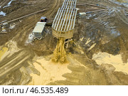 Gold mining. Flushing the rock with an old dredge. Environmental pollution. Стоковое фото, фотограф Евгений Ткачёв / Фотобанк Лори