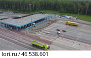 Russia, Moscow Region July 20 2021, payment point on paid routes M4 Don. View from height. Paid road with a fare payment by a transporter and cash. Редакционное видео, видеограф Скрипачев Антон / Фотобанк Лори