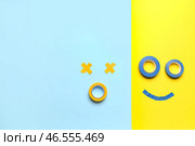 Лица из клейкой ленты на цветном фоне. Стоковое фото, фотограф Pixel_shot / Фотобанк Лори