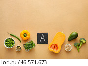 Набор полезных продуктов, богатых витамином А на цветном фоне. Стоковое фото, фотограф Pixel_shot / Фотобанк Лори