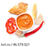Миска вкусного мухаммара, пита и ингредиенты на белом фоне. Стоковое фото, фотограф Pixel_shot / Фотобанк Лори
