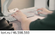 Close-up of hands interacting with cutting-edge gaming peripherals. Responsive design and ergonomic features demonstrate how modern technology supports precision and enjoyment in gaming activities. Стоковое видео, видеограф Енваев Андрей / Фотобанк Лори