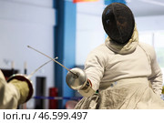 Фехтовальщик во время поединка. Стоковое фото, фотограф Дмитрий Феоктистов / ТАСС / Фотобанк Лори