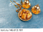 Cup of hot tea and a plate of turkish desserts. Стоковое фото, фотограф Сергей Толмачёв / Фотобанк Лори