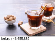 Очки вкусного холодного кофе и сахара на столе. Стоковое фото, фотограф Pixel_shot / Фотобанк Лори
