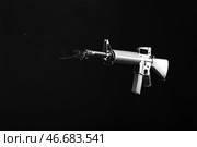 Штурмовая винтовка на темном фоне. Стоковое фото, фотограф Pixel_shot / Фотобанк Лори