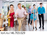 Foxtrot dance during Christmas or New Year celebrations in dance studio. Стоковое фото, фотограф Яков Филимонов / Фотобанк Лори