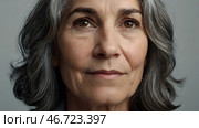 Minimalism. Studio portrait of a naturally aging elegant gray-haired elderly woman in an interior and clothes of calm tones. The concept of the elderly. Стоковое AI-изображение, AI-художник Photojuli / Фотобанк Лори