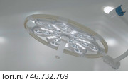 Bright surgical lamp to illuminate operating room. Стоковое фото, фотограф David Kashakhi / Фотобанк Лори