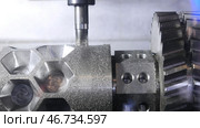 Close-up of the metal workpiece processing on the latest machine. Стоковое фото, фотограф David Kashakhi / Фотобанк Лори