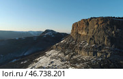 Aerial of snowy inaccessible and very high peaks of the mountains in the northeastern part of Italy on a winter sunny day. Стоковое фото, фотограф David Kashakhi / Фотобанк Лори