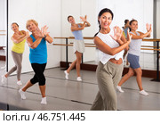 Group of active women practicing energetic dance in a studio. Стоковое фото, фотограф Яков Филимонов / Фотобанк Лори
