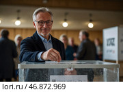A man votes in an election, throws a ballot paper into a ballot box. Стоковое AI-изображение, AI-художник Александр Поташев / Фотобанк Лори