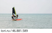 Windsurfer training in open sea. Стоковое фото, фотограф David Kashakhi / Фотобанк Лори