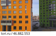 Beautiful stylish houses of different colors in a luxury residential complex. Стоковое фото, фотограф David Kashakhi / Фотобанк Лори